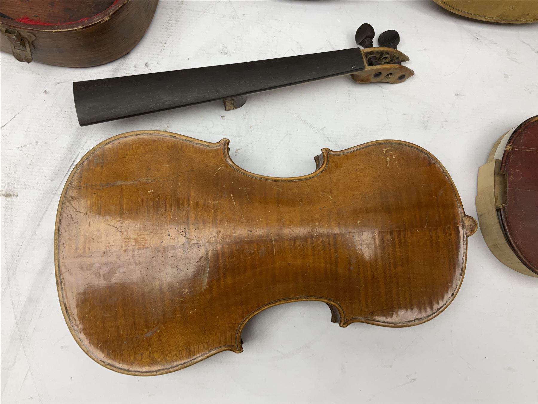 French violin for restoration with 36cm two-piece maple back and ribs and spruce top, bears label 'Lutherie Artistique M. Couturieux'; in wooden case; two modern three-quarter size violins in cases; and five violins for spares or repair