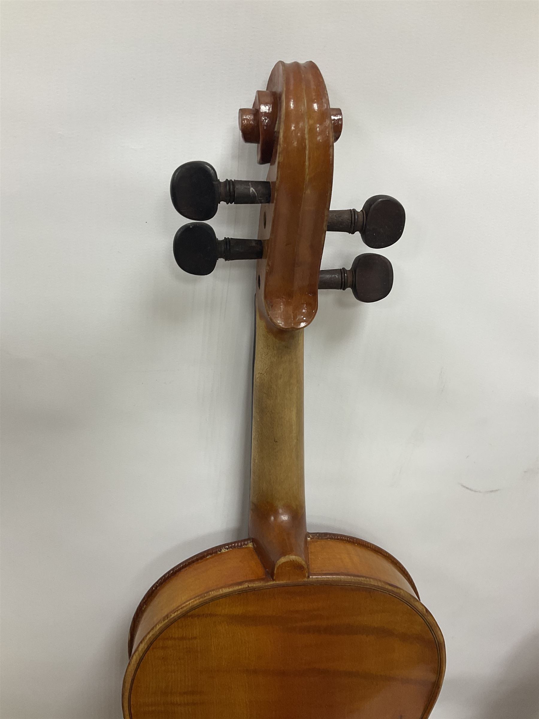 Four violins 1/8th size; half size with Nicolas Bertholini label; three-quarter size with Stradivarius copy label; and full size with Marquis De L'Air label (4)