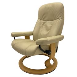 Ekornes - Stressless armchair upholstered in cream leather with matching footstool 
