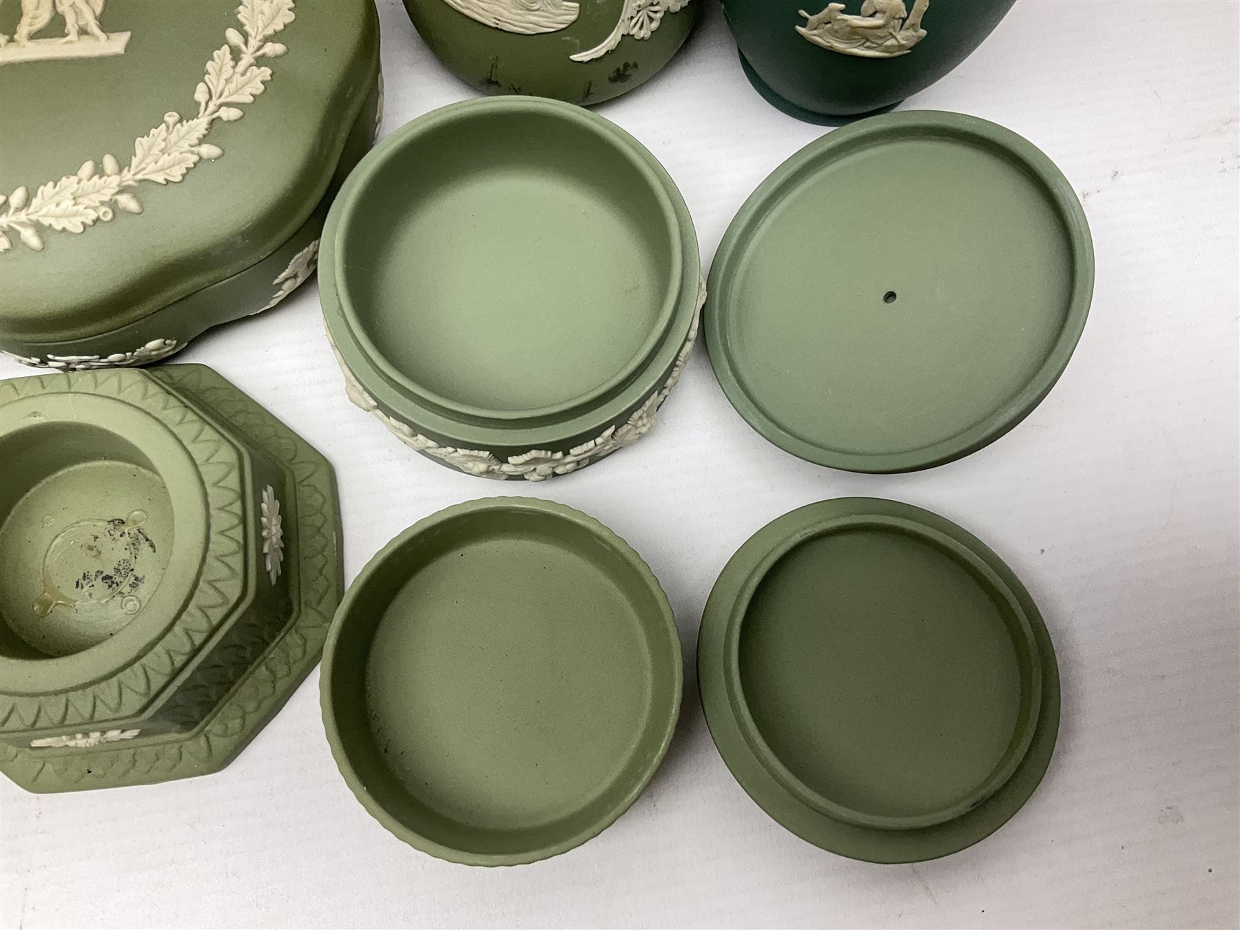 Collection of  Wedgwood green Jasperware, to include large jug, vases, trinket dishes, etc together with two teal Jasperware vases 