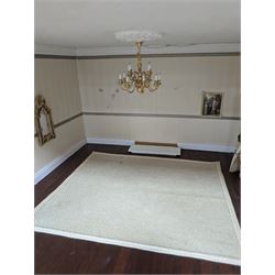 Two modern three storey dolls houses, each painted green with decorated interiors, both upon a single white wooden base, together with a large collection of dolls house furniture, accessories and figures 