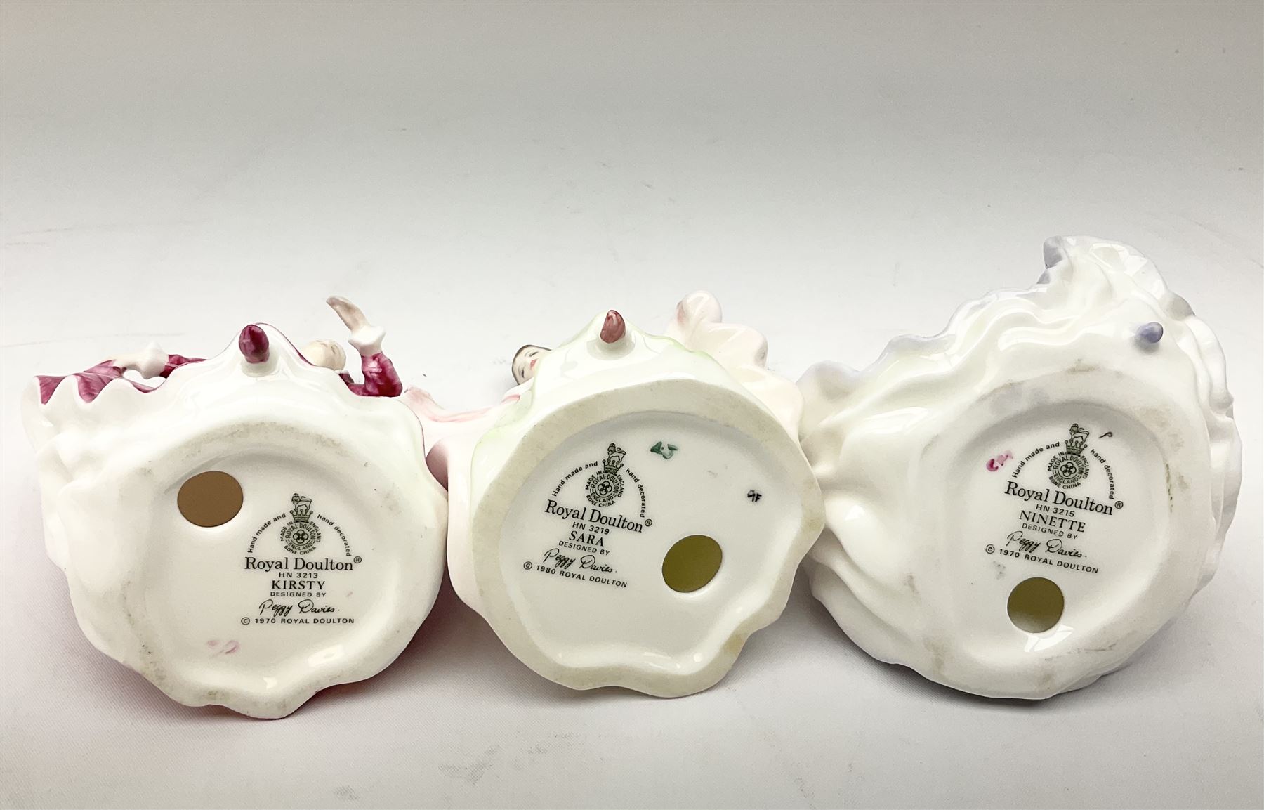 Royal Doulton Peggy Davies collection figures including Cherie HN2341, Debbie HN2400 and Royal Doulton miniature figures, Kirsty HN3213, Sunday Best HN3218, Sara HN3219, Ninette HN3215, Buttercup HN3908 and Fragrance HN3220.