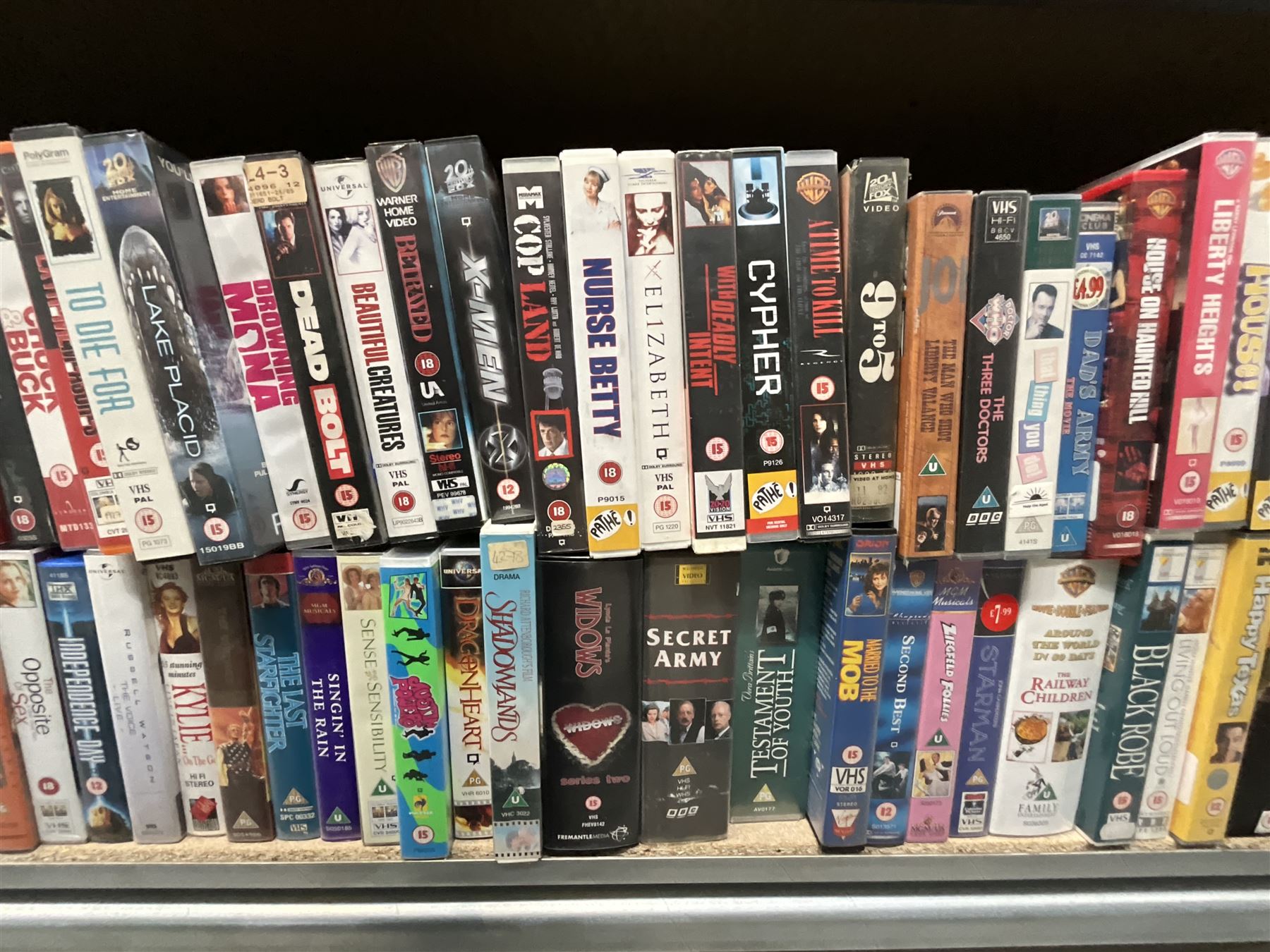 Two bays of vintage VHS videos, approx. 300 - viewing and collection at Duggleby Storage, YO11 3TX