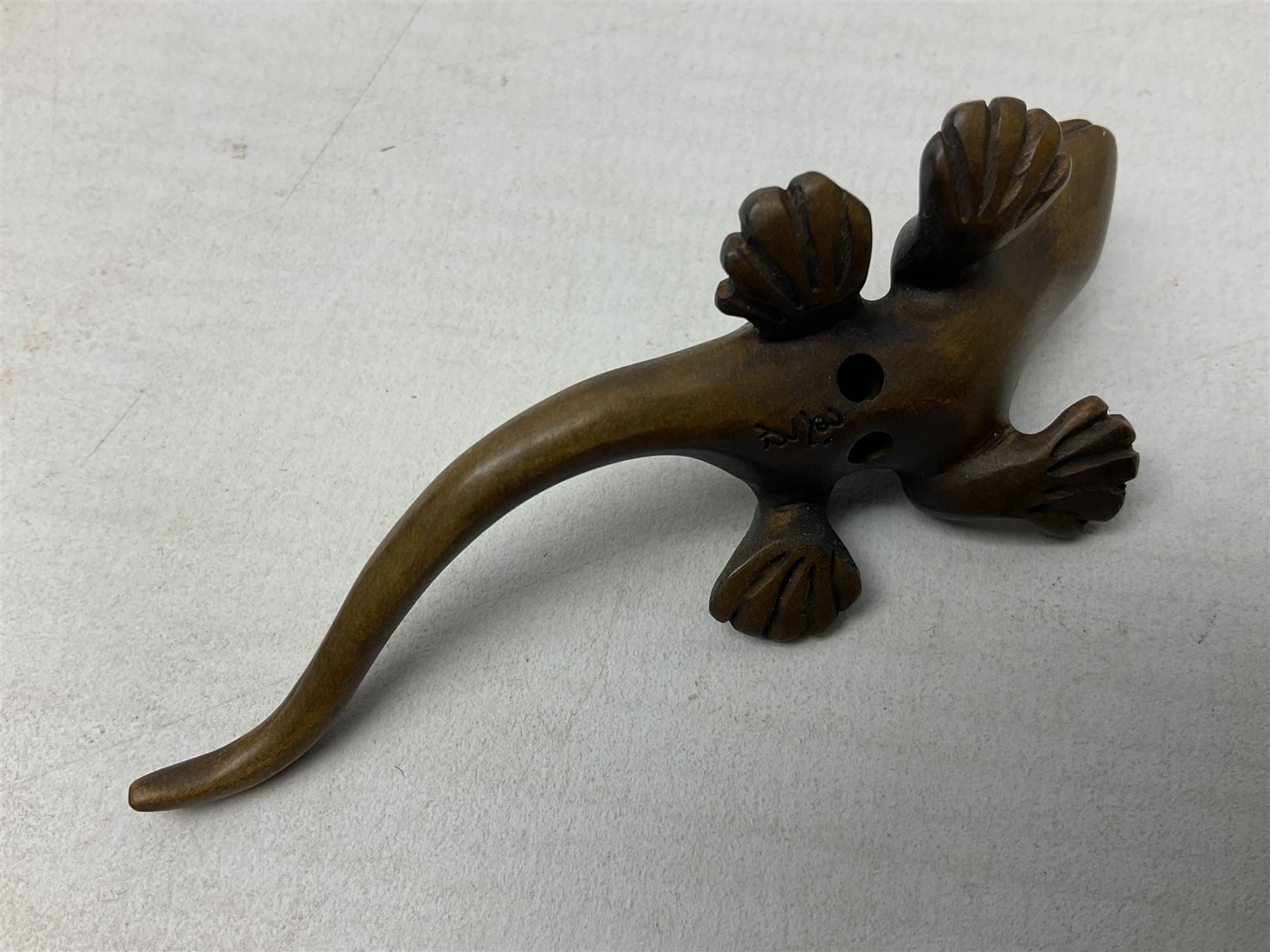 Six netsuke, modelled as a lizard, cricket, frog, bird on a flower, turtle and insect