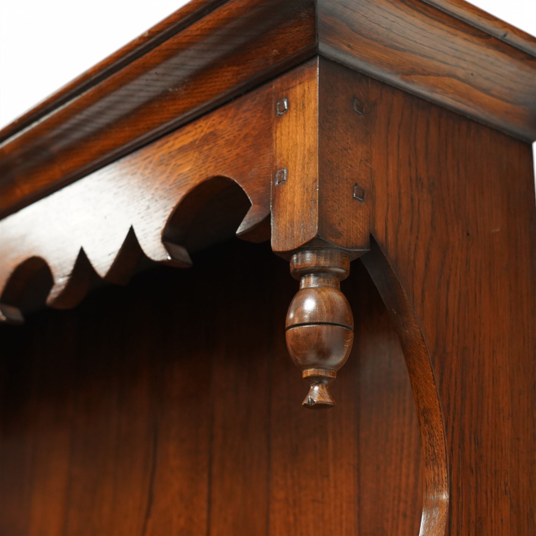 Gostins of Liverpool - Georgian design oak dresser, the two-tier rack with moulded cornice over shaped frieze and end supports, the dresser base with moulded rectangular top over tree drawers and two cupboards, panelled sides, on bracket feet