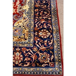  Najaf Abad red ground rug, central medallion, repeating border, 378cm x 263cm  