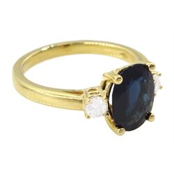 18ct gold sapphire and diamond three stone ring, single oval sapphire of approx 2.20 carat, with a single round brilliant cut diamond set either side, hallmarked, total diamond weight approx 0.25 carat