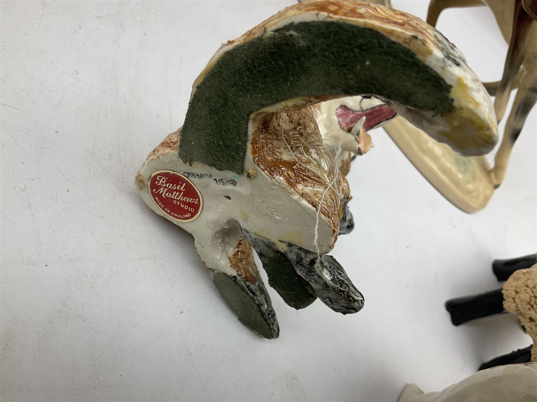 Three West German figures of Boxer dogs, Coopercraft figure of a dalmatian, Crested ware owl, West German horse figure group, Basil Matthews studio fox figure, Wade and other ceramic and composite  animal figures