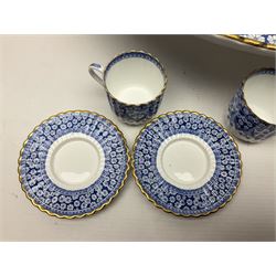 Late Victorian W T Copeland & Sons Primrose pattern coffee set for six, pattern no 2724, comprising coffee pot, milk jug, sugar bowl and six coffee cans and saucers, all upon a Lazy Susan, of circular form, with gilded rim and upon domed pedestal foot, with printed mark beneath, D44.5cm