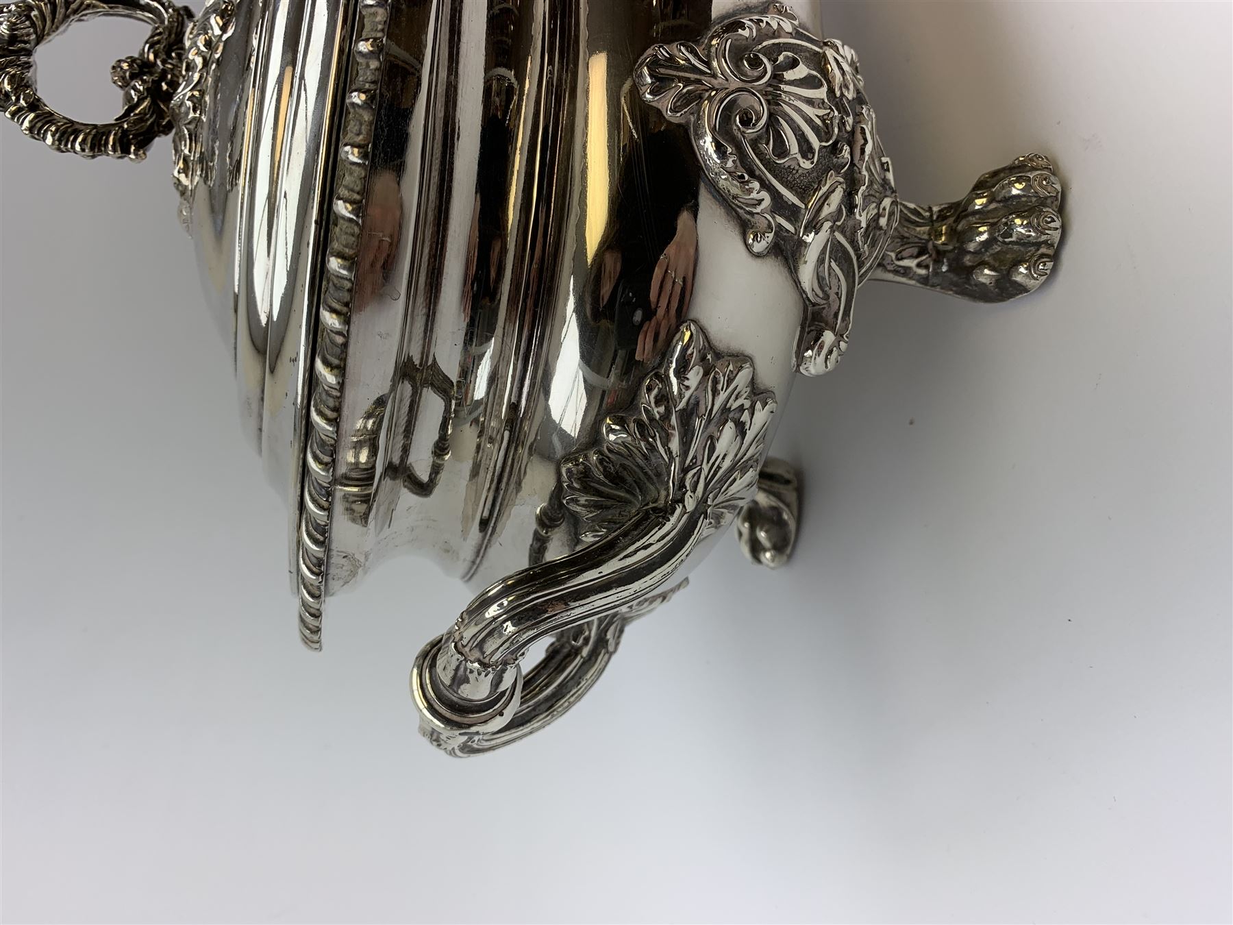 Matthew Boulton silver plated tureen and cover, the body of oval form with twin handles engraved with crest, probably for Whitgreave/Whitgrave family of Moseley Staffordshire, 'Regem Defendere Victum', (To defend the king even in his defeat/To defend the conquered king ), upon four paw feet, the cover with gadrooned rim and foliate loop handle 