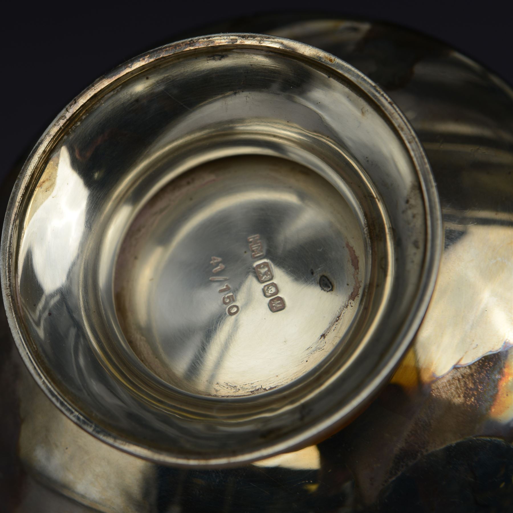 Modern limited edition silver centrepiece 'The Ripon Centrepiece', designed by Hector Miller for Aurum, the plain circular bowl with removable pierced parcel gilt lid, decorated in relief with flowers and foliage, the finial modelled as a hornblower, limited edition no. 41/150, hallmarked Hector Miller, London 1986, H15cm, boxed with certificate