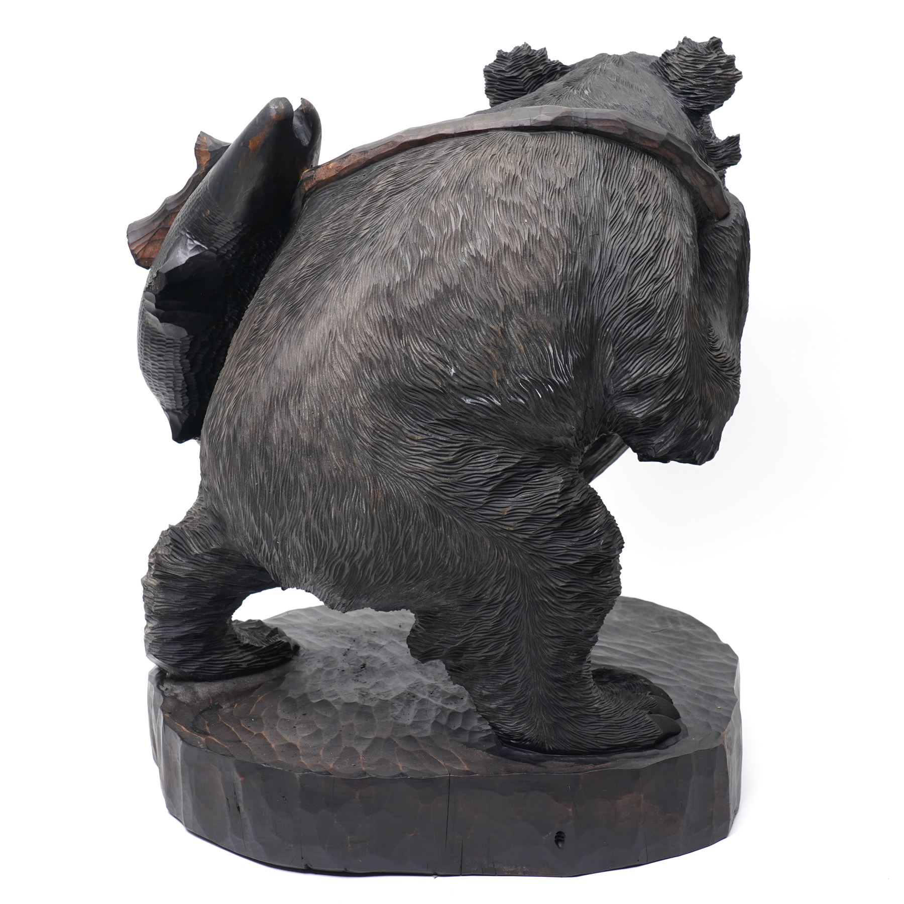 Large Black Forest style carved bear with a fish H50cm