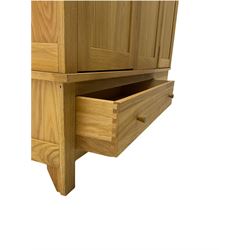 Corndell Furniture - light oak triple wardrobe, enclosed by three panelled doors, one long and one short drawer