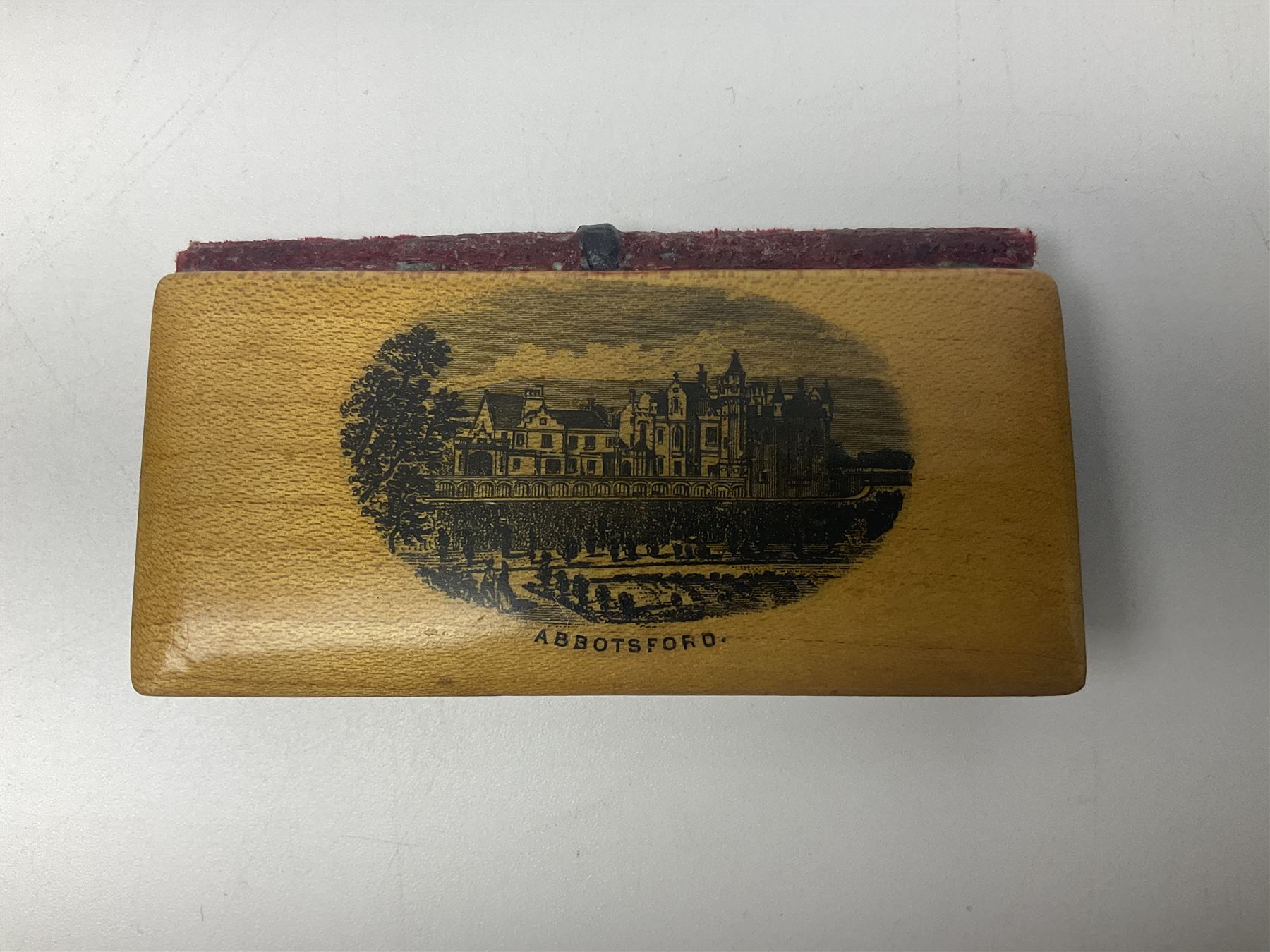 Six sewing related Mauchline ware comprising an oval reel box with internal label for Clark & Co's, tape measure, pin case and three thimble holders of ovoid form 