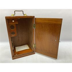  Brass field microscope, together with a cased microscope and twenty five microscope slides