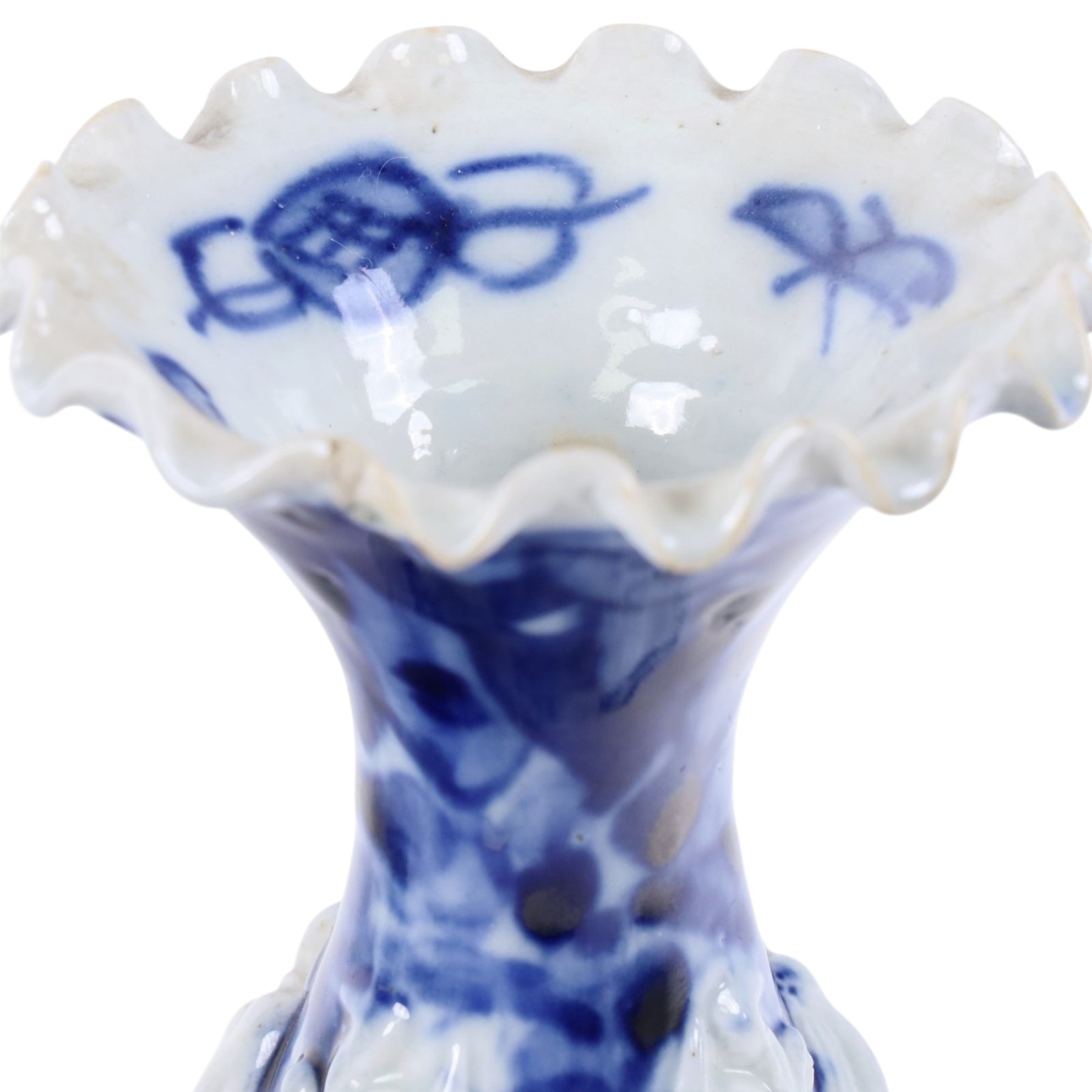 Pair of blue and white moulded vases, decorated with dragons amongst clouds, together with two blue and white planters painted, the first decorated with pagodas within a landscape scene, the other with musicians, vases H26cm 