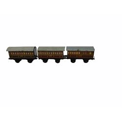 Bing '00' gauge - Table Top train set with clockwork 2-4-0 LMS locomotive and tender, three passenger coaches, signal box and thirteen sections of track; unboxed.