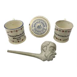  Early Victorian marriage mug for Thomas and Caroline Parkinson dated 11th Sept. 1845 Hull H8cm, similar christening mug for their daughter Hannah Matilda, blue/white transfer printed pot lid with base for Francis Earle, Pharmaceutical Chemist, 22 Market Place, Hull with central study of Holy Trinity Church and clay pipe, the bowl as man's head (4)  