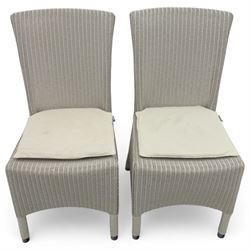 Neptune – Sheldrake limed oak extendable dining table and eight Havan loom chairs, the oval top in limed oak finish with four additional leaves extending the table to seat up to ten (Extends to cm), raised on turned legs with two additional centre supports, the matching Havan loom chairs finished in grey with cream upholstered seat covers (H 95cm, W 47cm, D 55cm)