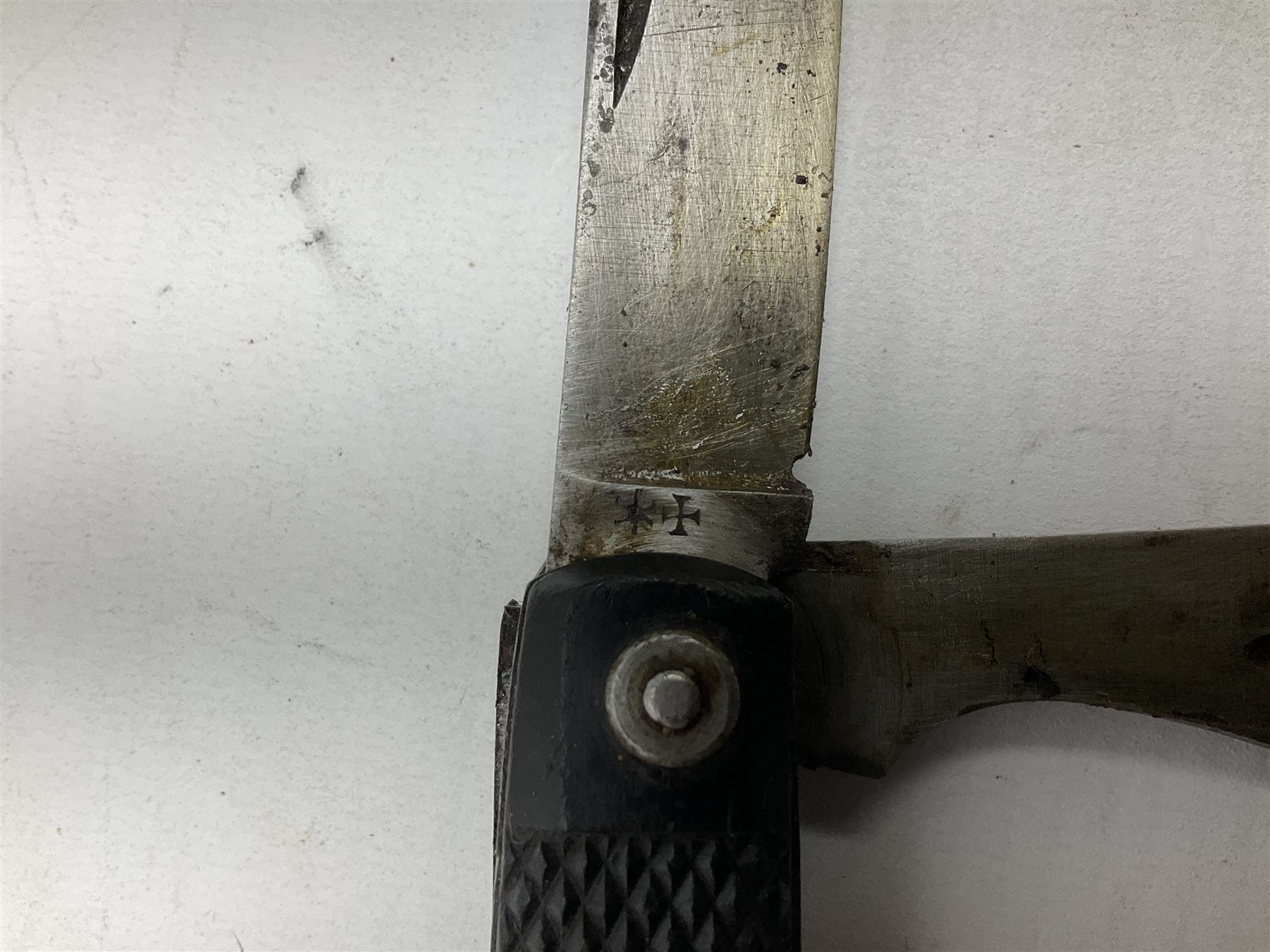 WW2 British army folding jack/clasp knife with blade and can opener marked with broad arrow and date 1944; a similar unmarked British army folding three-blade knife; and another later similar British Army knife marked Wade & Butcher Sheffield England (3)