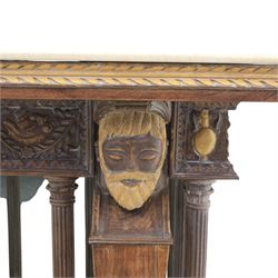 20th century carved hardwood console table in Renaissance taste, moulded marble slab top over a frieze decorated with festoons and roundels, the angles carved with grotesque mask brackets, supported by six fluted columns with carved mask and paw feet terminals, on a stepped plinth base with mirrored back