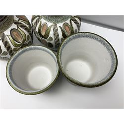 Pair of Denby Glyn Colledge stoneware vases of baluster form with floral decoration over cream ground, together two jardiniere in a similar design, vases H24cm