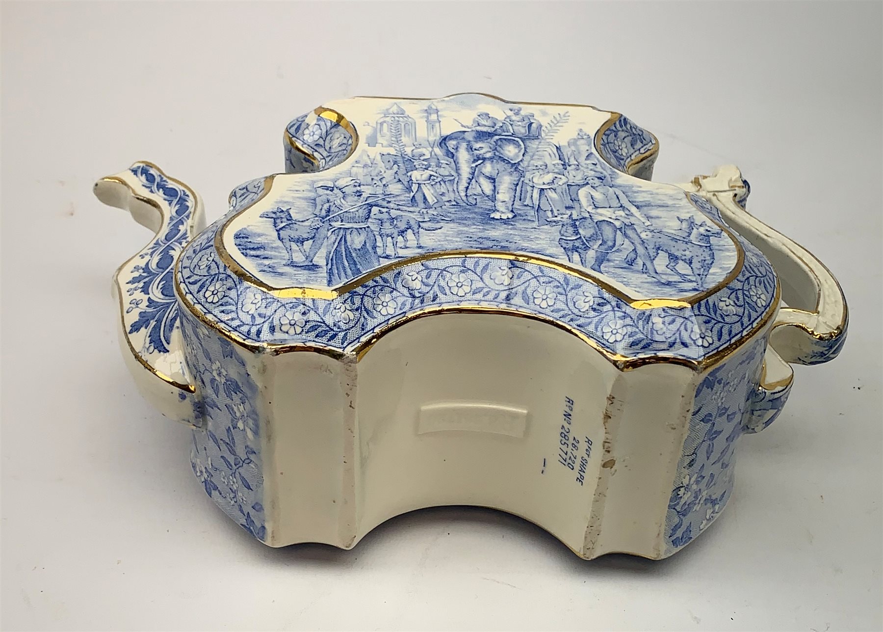 A Victorian Burgess and Leigh Aesthetic style blue and white teapot, decorated with an Indian hunting scene and heightened with gilt to edges, H17cm. 
