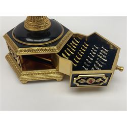 Franklin Mint House of Faberge; The Imperial Jeweled Egg Chess set, the egg opening to reveal a chess board, with a draw to the hexagonal base holding the miniature chess pieces, H23cm 