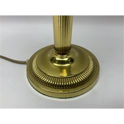 Brass bankers lamp, with a a brass cased shade over brass shades, raised upon a circular base, H34cm