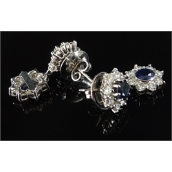  Pair of 18ct gold white gold sapphire and diamond double cluster pendant ear-rings, stamped 750  