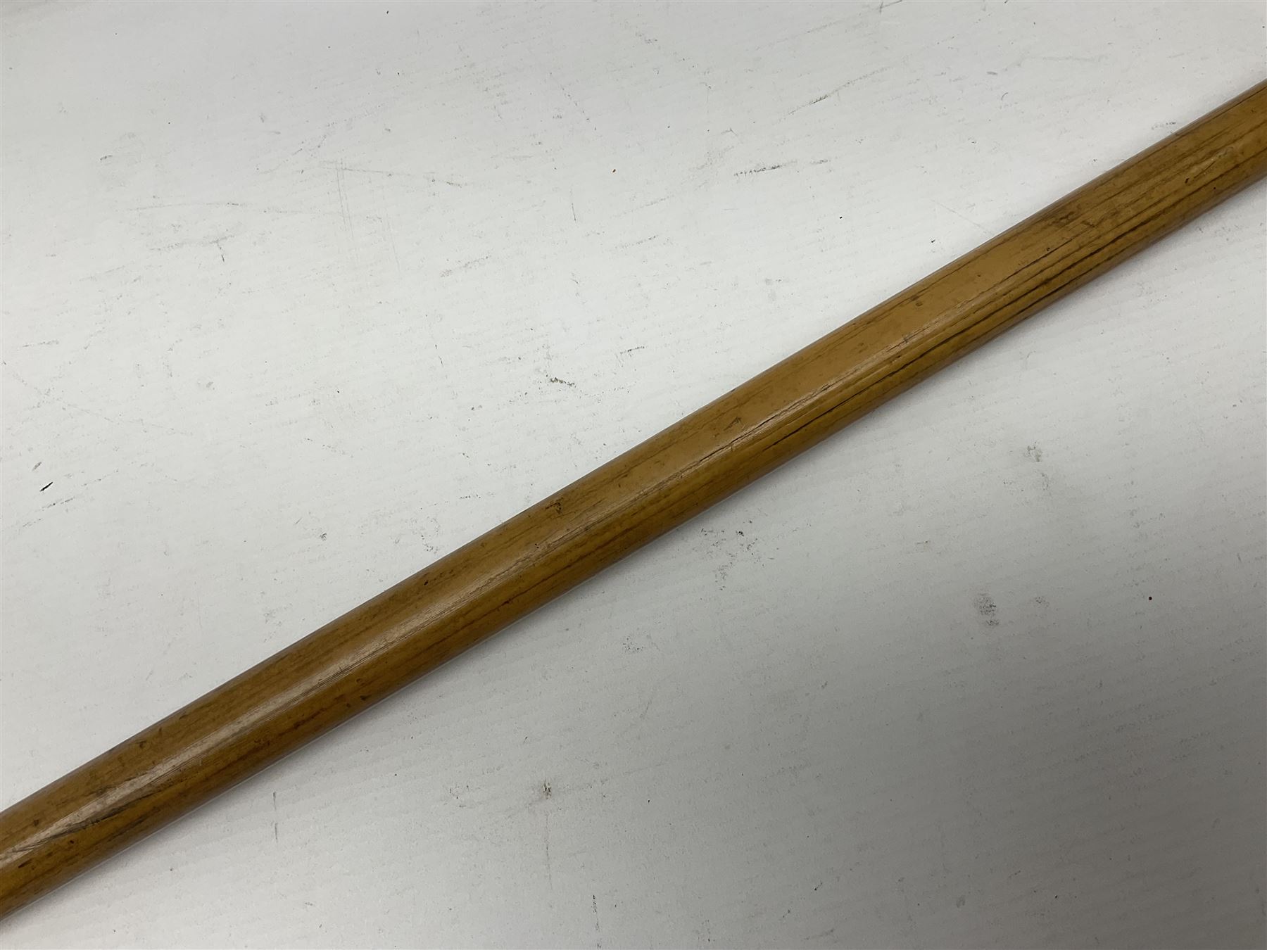 Malacca walking cane, with domed Burmese silver pommel embossed with deities, L91.5cm