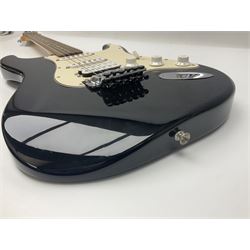Mexican Fender Stratocaster electric guitar in black c2003 with Floyd Rose tremolo system, serial no.MZ3129600; L98cm; in Freestyle fitted case with 2006 Diamond Anniversary booklet