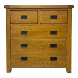 Contemporary solid oak chest, fitted with two short over three long graduating drawers, bl...