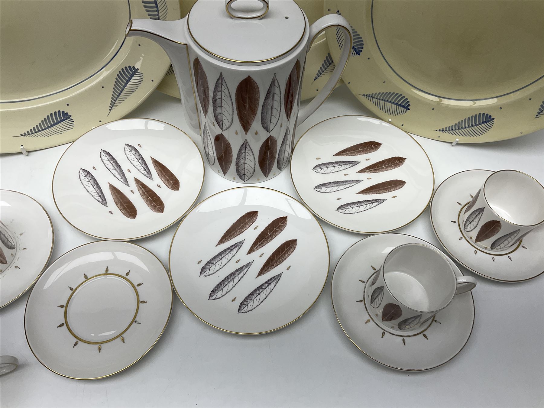 Susie Cooper Hyde Park pattern coffee set, comprising coffee pot, four coffee cans and saucers, dessert plates, together with three plates in a similar design 