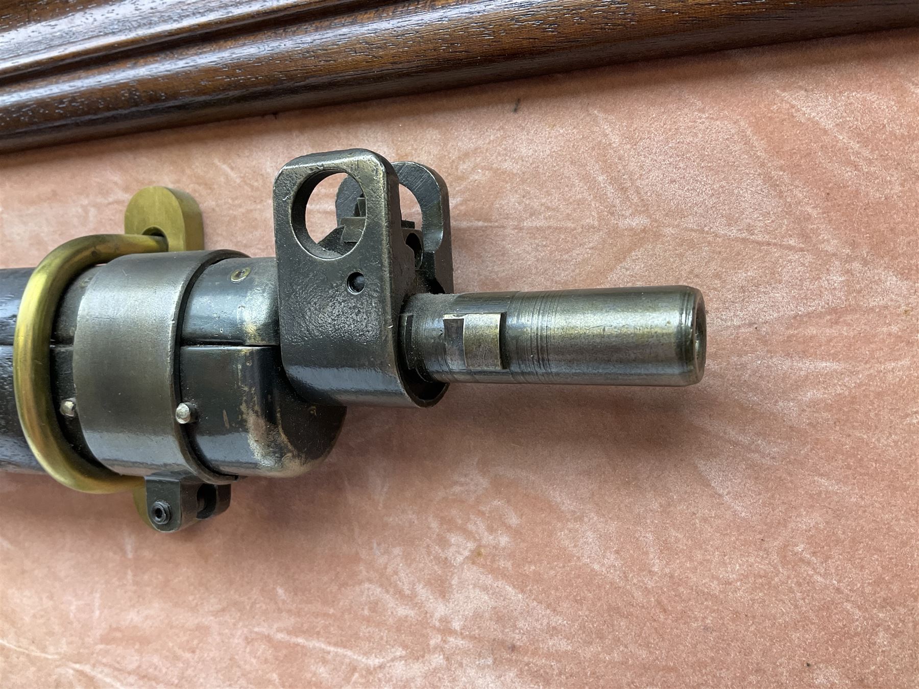 WW2 Lee Enfield No.4 Mk.1 .303 bolt-action rifle with hinged butt compartment, made by SA Ltd., Long Branch, Canada 1942, serial no.5L0646 L113cm; mounted on a framed display board with No.4 Mk.II spike bayonet, No.9 Mk.1 blade bayonet, two inert 5-round clips and brass biographical plaque by Antler Military Originals detailing DA Cert No.C3444 OLD STYLE DEACTIVATION SO FIREARMS CERTIFICATE REQUIRED OR RFD