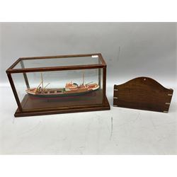 Model ship in glazed case together with a wood letter rack