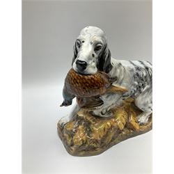 Royal Doulton model of an English setter carrying a pheasant, HN 2529, designed by Frederick Daws H21cm, L27cm.