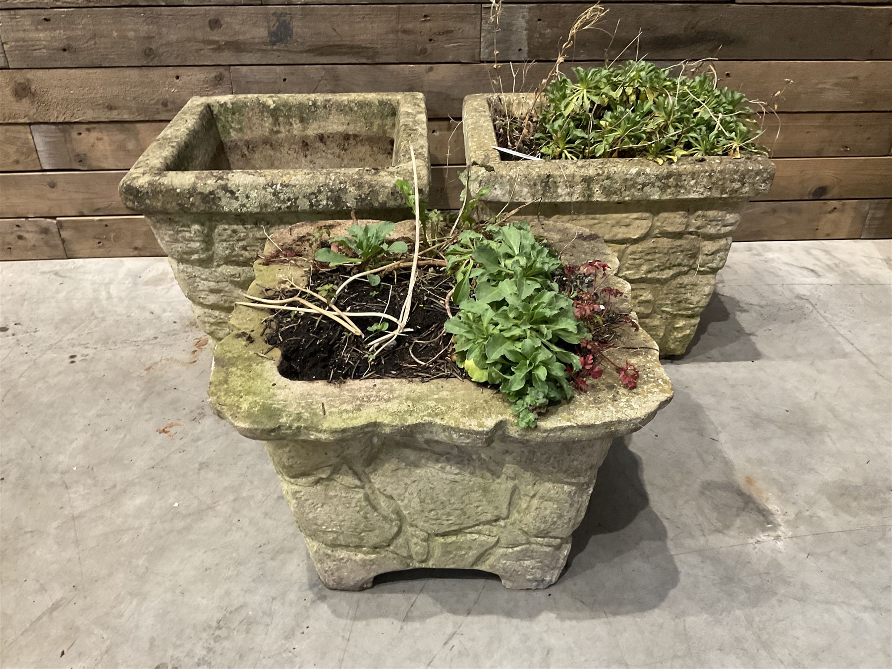 Pair of cast stone pattern tapering square planters, and a similar planter (3)