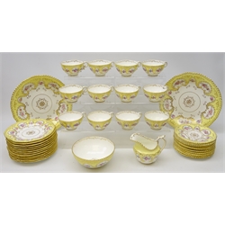 Early 20th Century Coalport tea service painted with floral bouquets against a lemon border, lacking one saucer   