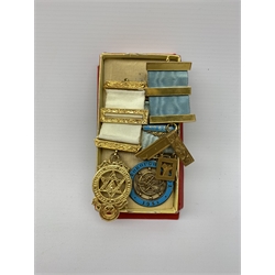 Masonic Regalia - 9ct gold jewel by Vaughton & Sons Birmingham inscribed ' Yarborough Lodge N0.633 presented by the Brethren to Bro. Ernest Wallwork W.M. 1952-53 as a token of high esteem December 1953', gross weight 29.8gm; silver and enamel Yarborough Lodge 1954 medal also inscribed to Bro. E. Wallwork; gilt metal jewel; two aprons and sash etc