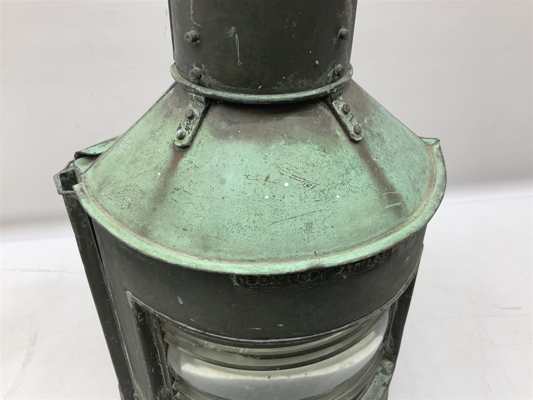 20th century Alderson & Gyde Ltd copper ship lantern, with swing handle and a plaque inscribed Bow Port Patt 23 and ribbed clear glass shade