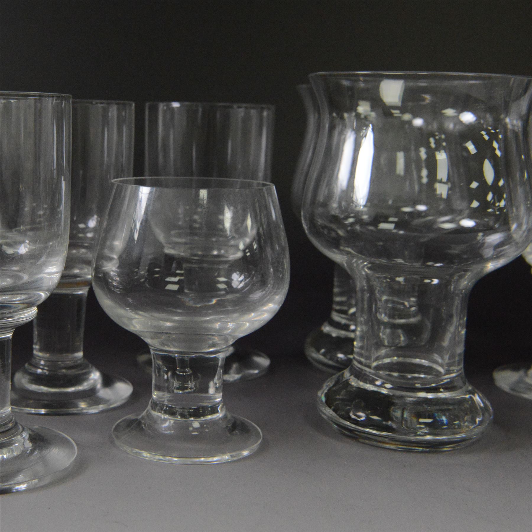 Dartington Crystal pieces designed by Frank Thrower, including claret glasses, Vin decanter, ale glasses and brandy glasses