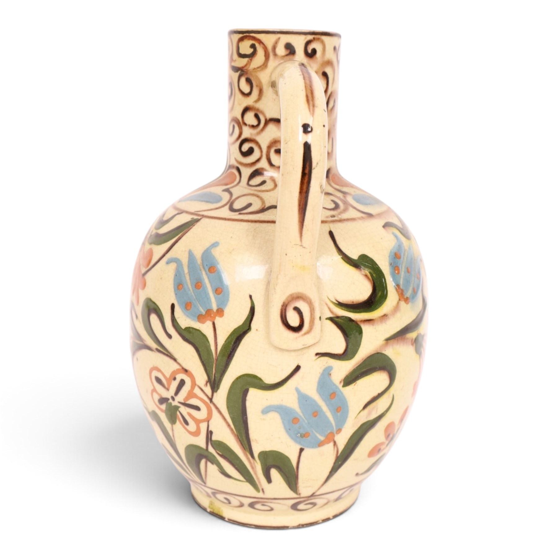 Iznik-style ewer, late 19th/early 20th century, the ovoid body painted with stylized flowers upon a cream ground, the neck with repeating scrolling boarder, H28cm