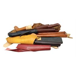 Leather: approximately twelve skins to include large offcuts and part skins including tan, brown and black examples