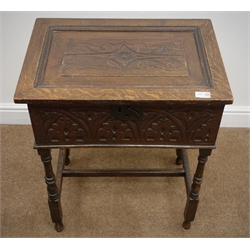  18th Century and later oak table/bible box, heavily carved hinged top and sides, on turned supports joined by stretchers, W57cm, H71cm, D40cm  