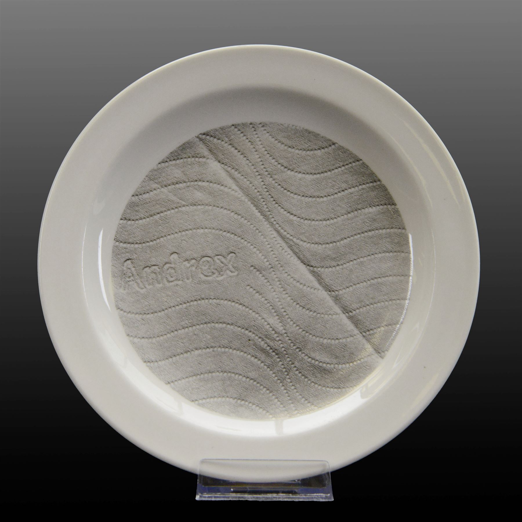 Alice Aldis (British 2002-); 'Toilet Paper Ornamentation - Collection One', hand-bound catalogue; together with three transfer-printed plates, largest D20cm 