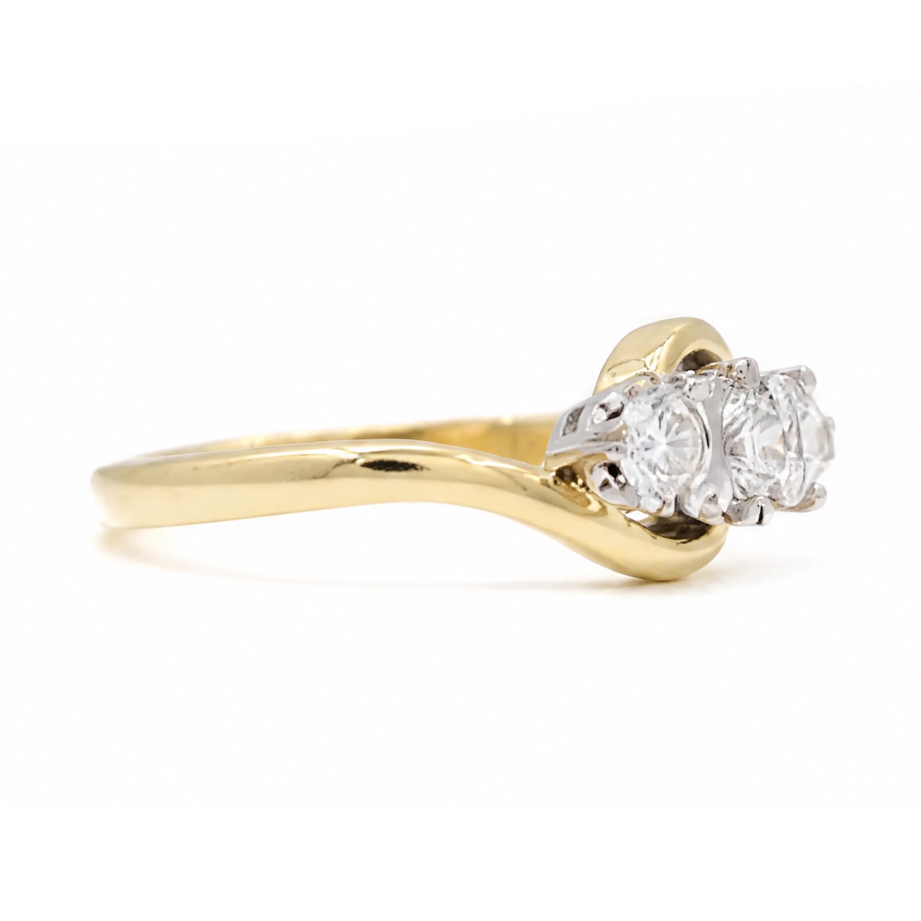 18ct gold diamond crossover ring, set with three round brilliant cut diamonds, hallmarked, total diamond weight 0.50 carat