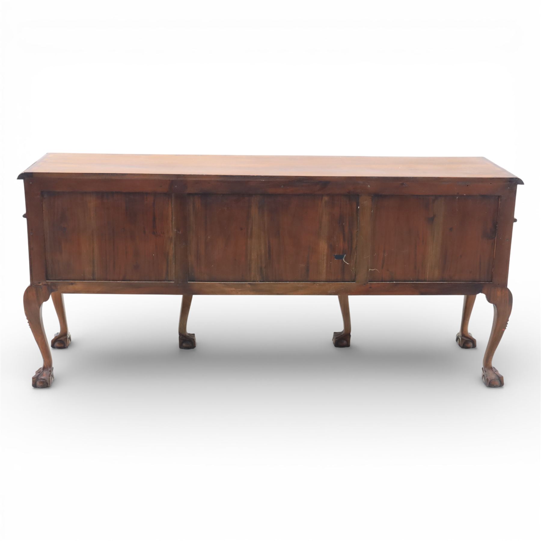 Georgian design mahogany sideboard, the rectangular top with moulded gadrooned edge, fitted with a central frieze drawer flanked by cupboard doors, raised upon cabriole legs terminating in ball and claw feet