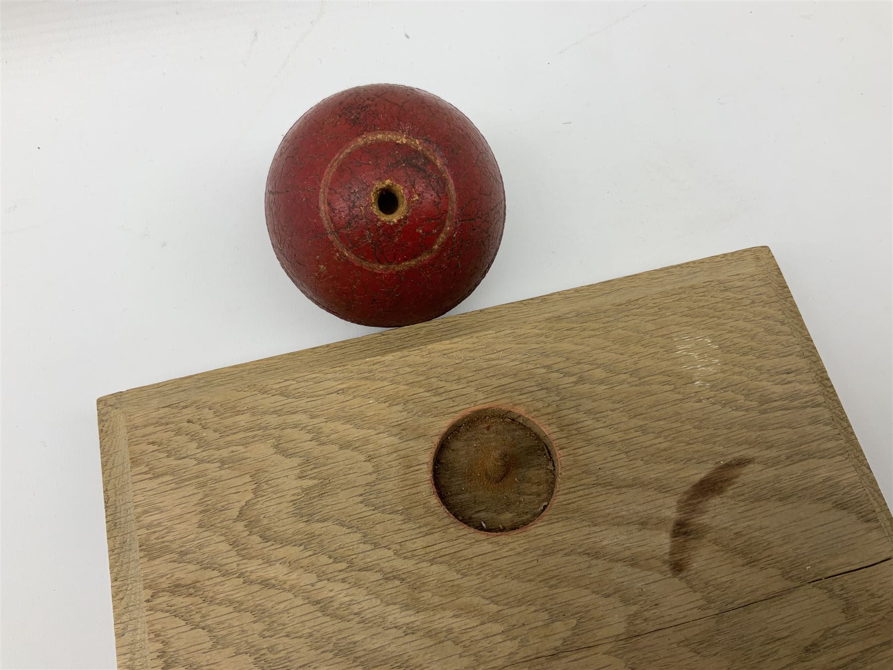 Raich Carter - early school cricket trophy of a cricket ball mounted on an oak base with white metal plaque inscribed 'Swan Cup Final/July 1927/Hendon v Jas.Wms.St/Scores/Hendon 189 for 2 wickets/Jas.Wms.St 55/Carter 111 runs (not out) Four wickets for 21 runs/Hendon School Souvenir/from his Head master G.F. Park' L20cm. Provenance: By direct descent from the family of Raich Carter having been consigned by his daughter Jane Carter.