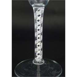18th century toasting glass or flute, the funnel bowl upon a double series opaque twist stem and conical foot, H21cm
